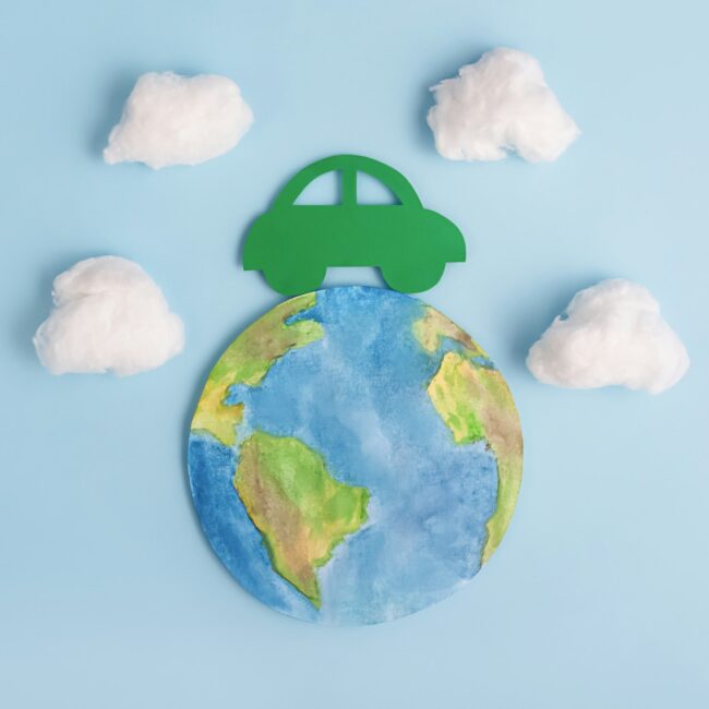 Green car and planet earth. Ecological transport. Ecology concept.